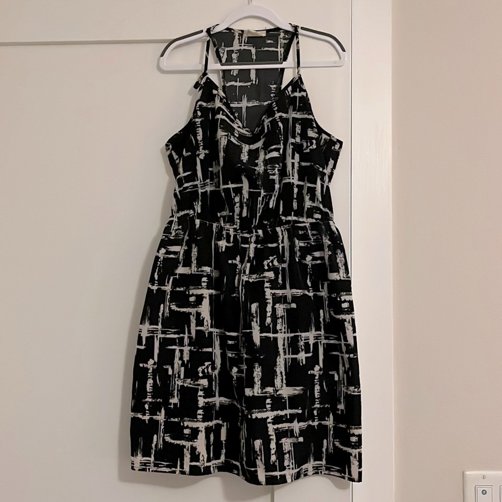 Racer back printed sundress with back slit cut outs.
